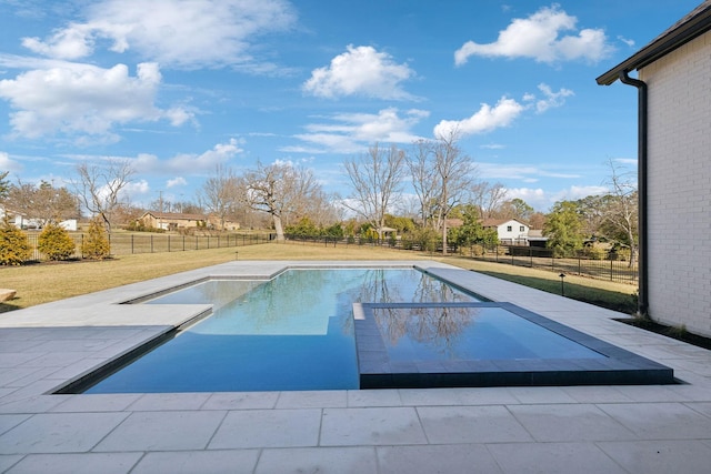 view of pool with a patio area, a fenced backyard, a fenced in pool, and a lawn