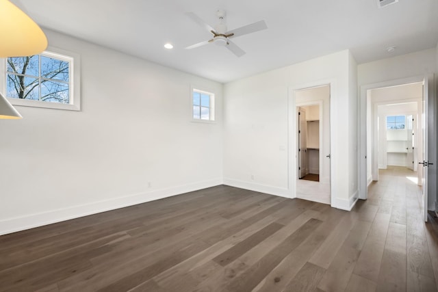 unfurnished bedroom with visible vents, baseboards, a ceiling fan, dark wood-style flooring, and recessed lighting