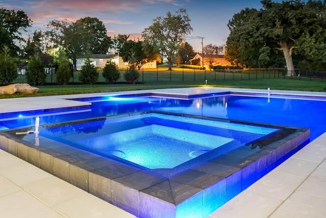 view of pool featuring a fenced in pool, a fenced backyard, a lawn, and an in ground hot tub