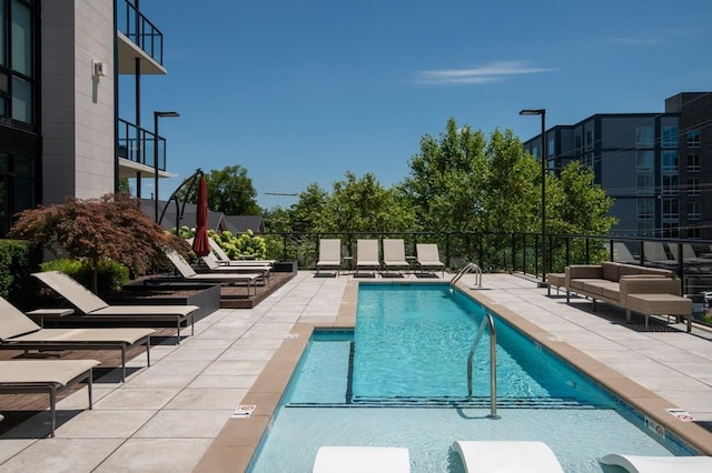 pool with a patio