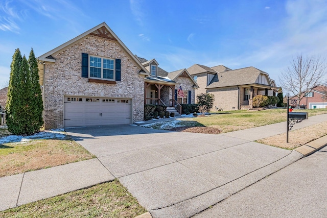 view of front of house with brick siding, concrete driveway, covered porch, a garage, and a front lawn