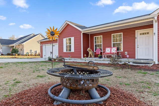 view of front of home featuring driveway and an attached garage