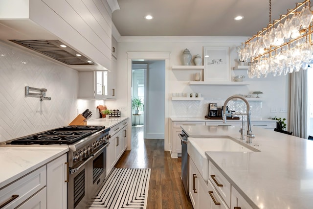 kitchen with range with two ovens, white cabinetry, premium range hood, and open shelves