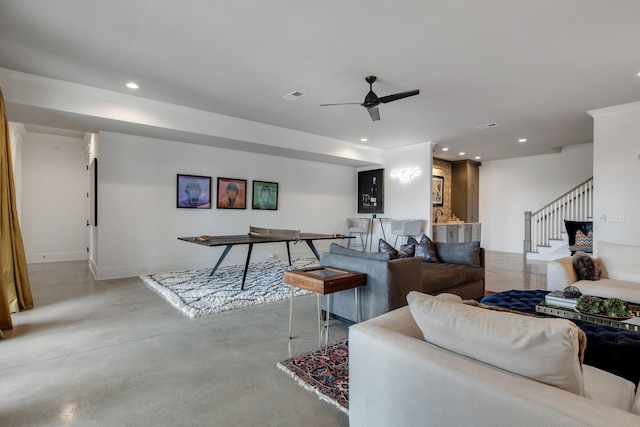 living room featuring visible vents, ceiling fan, stairs, concrete flooring, and recessed lighting