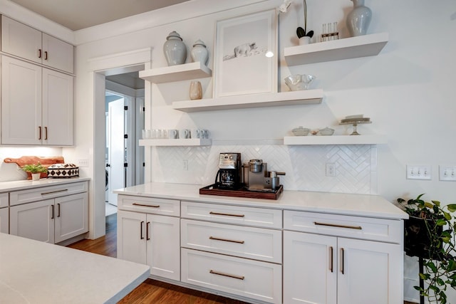 kitchen with light countertops and open shelves