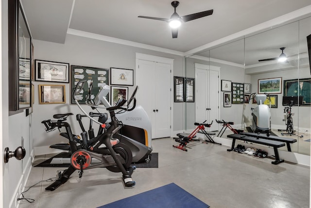 exercise area with baseboards and a ceiling fan