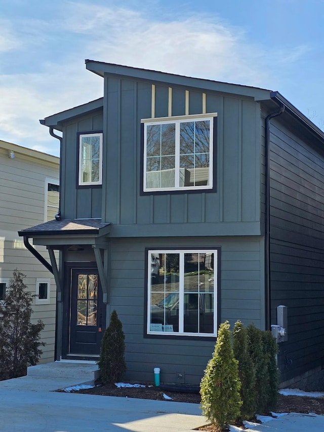 view of front facade with board and batten siding