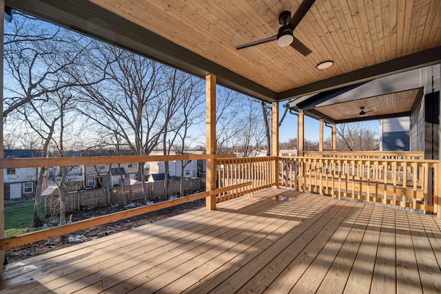 wooden terrace featuring ceiling fan