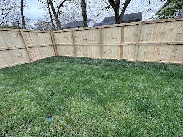 view of yard featuring fence
