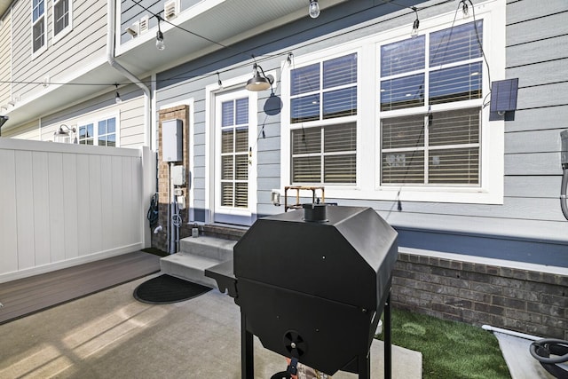 view of patio / terrace with fence and area for grilling