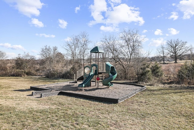 community playground featuring a lawn