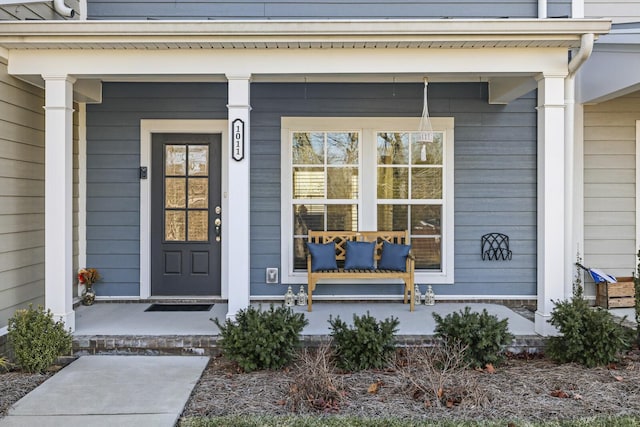 entrance to property with covered porch