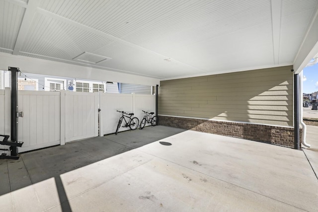 garage with fence