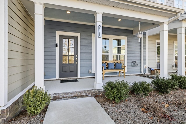 entrance to property with a porch