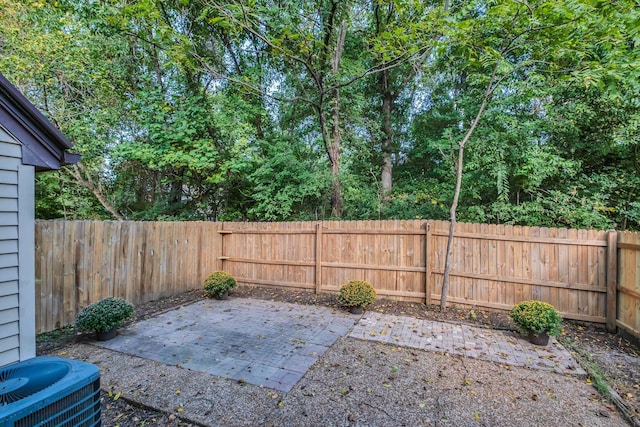 view of patio / terrace featuring central AC unit and a fenced backyard