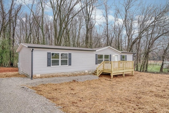 manufactured / mobile home with crawl space and a deck