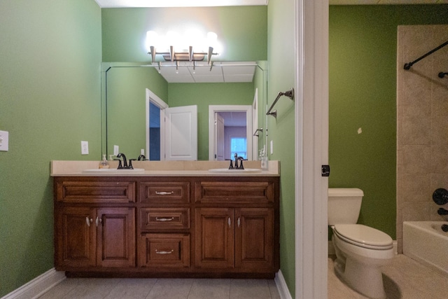 full bath featuring a sink, toilet, and double vanity