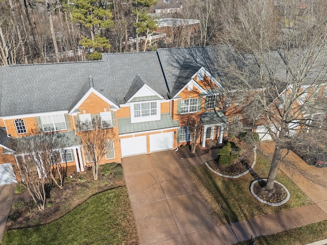 view of front of house featuring driveway and a garage