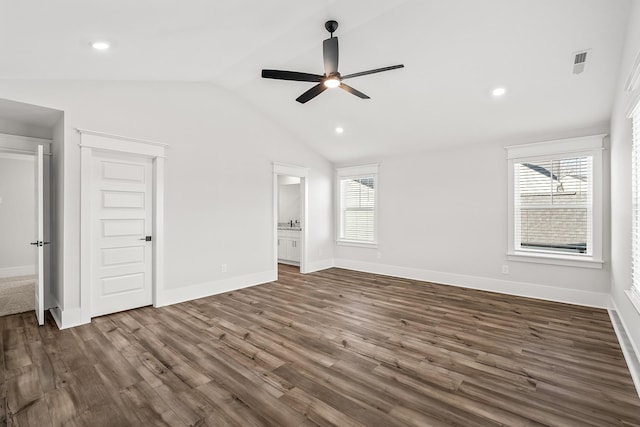 unfurnished bedroom featuring lofted ceiling, recessed lighting, visible vents, baseboards, and dark wood finished floors