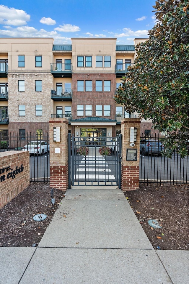 view of gate featuring fence