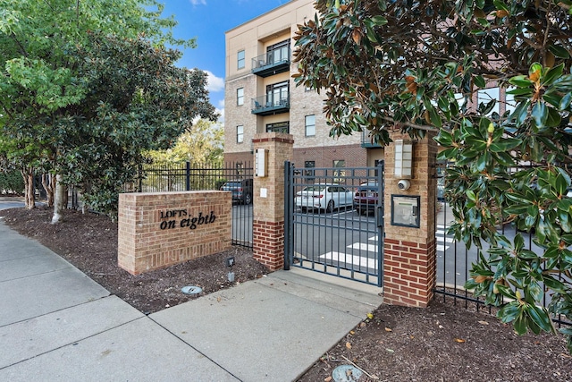 view of gate featuring fence