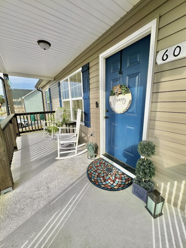 property entrance with a porch