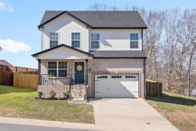 traditional-style house featuring an attached garage, brick siding, fence, concrete driveway, and a front yard