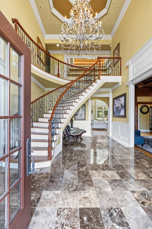 1465 New Columbia Hwy, Lewisburg, TN 37091 - foyer featuring stairway, a decorative wall, a notable chandelier, and crown molding