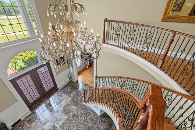 1465 New Columbia Hwy, Lewisburg, TN 37091 - entryway featuring stairs, french doors, a high ceiling, an inviting chandelier, and marble finish floor