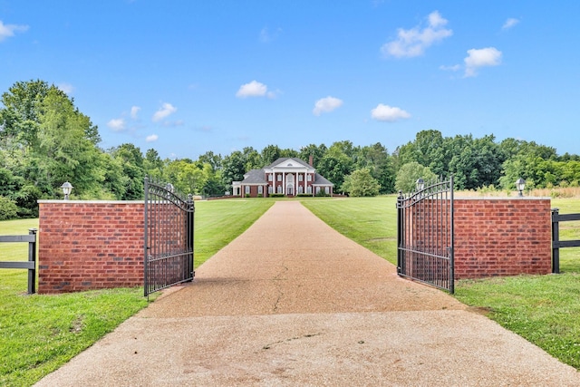 1465 New Columbia Hwy, Lewisburg, TN 37091 - view of gate featuring a lawn