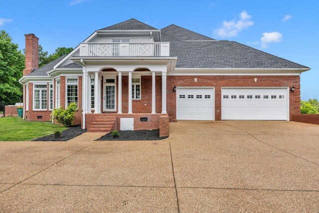 1465 New Columbia Hwy, Lewisburg, TN 37091 - view of front of home with a garage, driveway, crawl space, a balcony, and a chimney