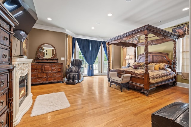 1465 New Columbia Hwy, Lewisburg, TN 37091 - bedroom featuring a glass covered fireplace, wood finished floors, crown molding, and access to outside