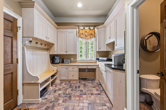 1465 New Columbia Hwy, Lewisburg, TN 37091 - kitchen featuring crown molding, brick floor, and built in study area