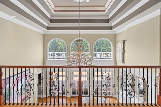 1465 New Columbia Hwy, Lewisburg, TN 37091 - hallway featuring a tray ceiling, plenty of natural light, a chandelier, and ornamental molding