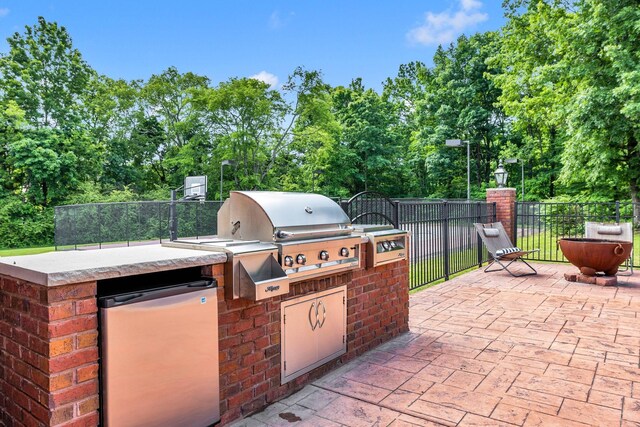 1465 New Columbia Hwy, Lewisburg, TN 37091 - view of patio / terrace featuring area for grilling, a grill, and fence