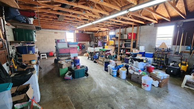 garage with concrete block wall