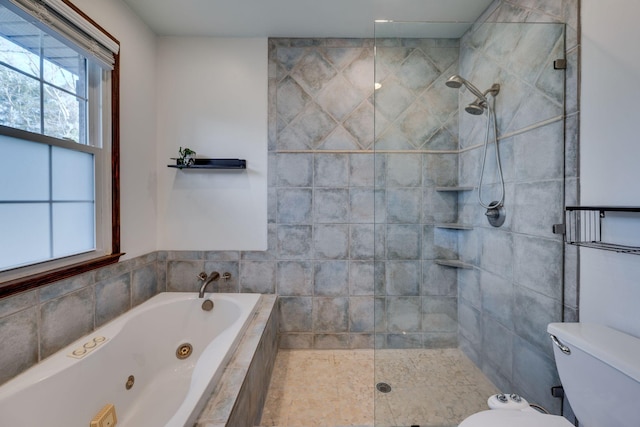 full bathroom featuring toilet, walk in shower, and a whirlpool tub