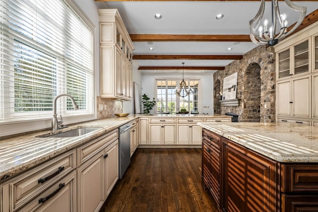 6054 Pelican Way, College Grove, TN 37046 - kitchen featuring cream cabinetry, a chandelier, dark wood-style floors, plenty of natural light, and beamed ceiling