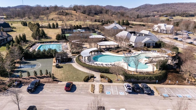 6054 Pelican Way, College Grove, TN 37046 - drone / aerial view of a pool area and mountains