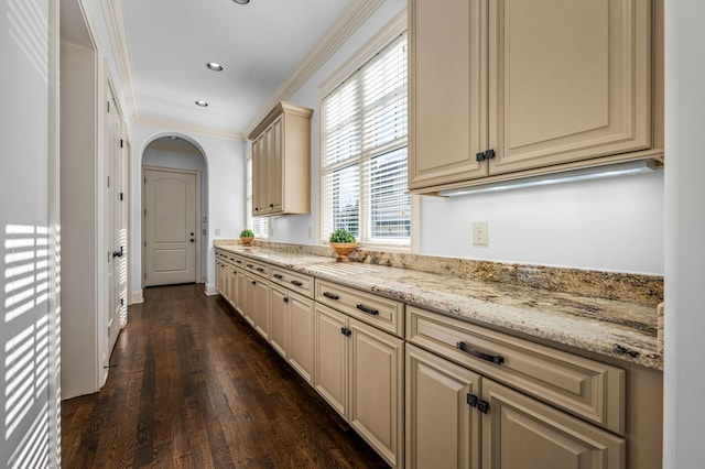 6054 Pelican Way, College Grove, TN 37046 - kitchen with cream cabinets, dark wood finished floors, light stone countertops, recessed lighting, and ornamental molding