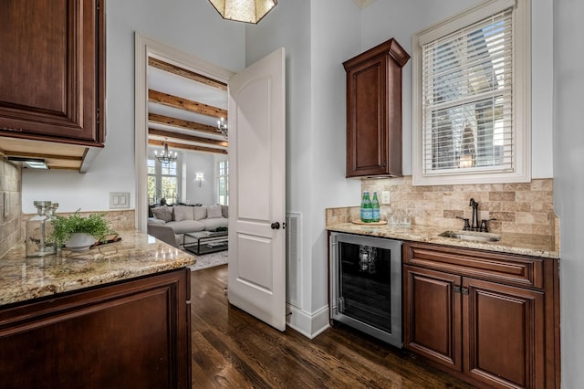 6054 Pelican Way, College Grove, TN 37046 - indoor bar featuring beverage cooler, dark wood-type flooring, decorative backsplash, beamed ceiling, and a chandelier
