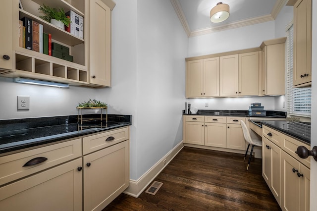 6054 Pelican Way, College Grove, TN 37046 - kitchen featuring crown molding, cream cabinetry, dark wood-style floors, open shelves, and dark stone counters