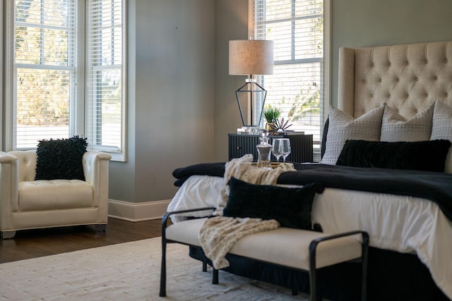 6054 Pelican Way, College Grove, TN 37046 - bedroom featuring wood finished floors and multiple windows