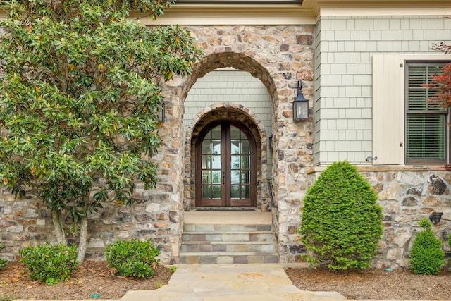 6054 Pelican Way, College Grove, TN 37046 - doorway to property featuring stone siding and french doors