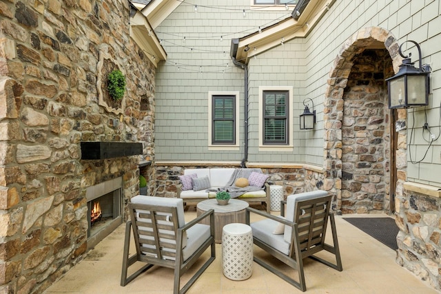 6054 Pelican Way, College Grove, TN 37046 - view of patio / terrace featuring an outdoor living space with a fireplace