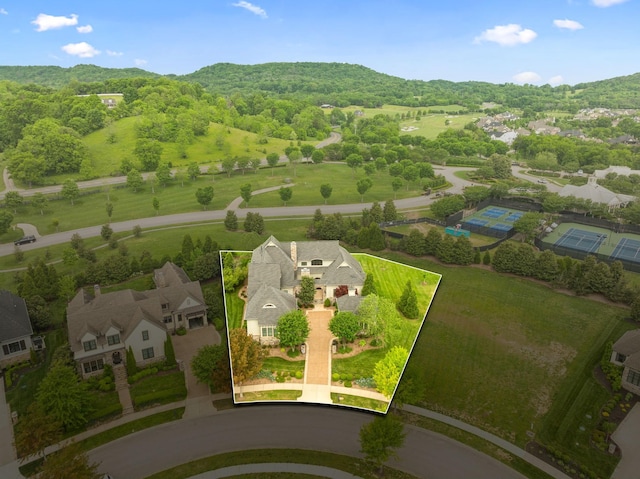 6054 Pelican Way, College Grove, TN 37046 - aerial perspective of suburban area featuring property boundaries highlighted and a heavily wooded area