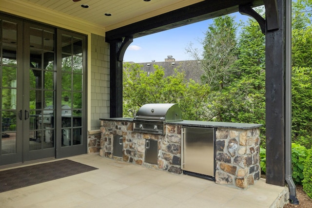 6054 Pelican Way, College Grove, TN 37046 - view of patio / terrace featuring french doors and exterior kitchen