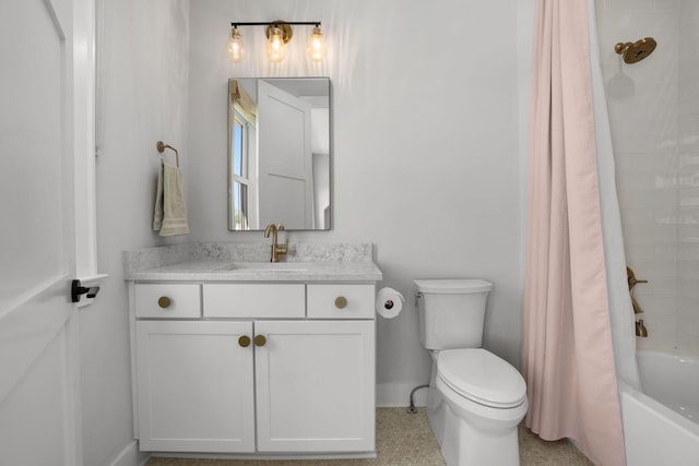 full bathroom featuring toilet, shower / tub combo, vanity, and baseboards