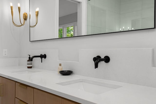 bathroom featuring double vanity and a sink