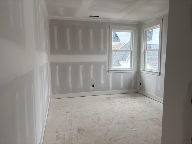 empty room with baseboards